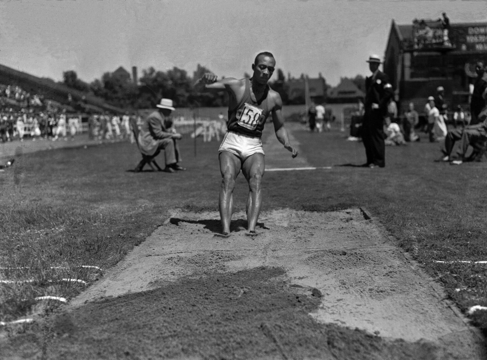 1936: Jesse Owens sets 100-meter record of 10.2 seconds at meet in Chicago